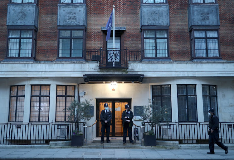 Police officers stand outside King Edward VII's Hospital, where Britain's Prince Philip was admitted, in London, Britain.