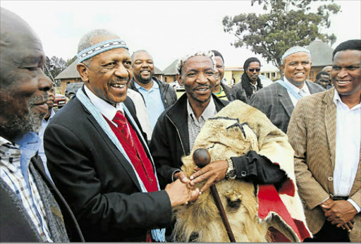 HERE TO HELP: Businessman and ANC presidential hopeful Mathews Phosa, second from left, greets AmaXhosa king Mpendulo Zwelonke Sigcawu after donating six Nguni cattle to the king and pledging his assistance in improving education, health and agriculture in the monarch’s area of jurisdiction at an event in Willowvale on Friday