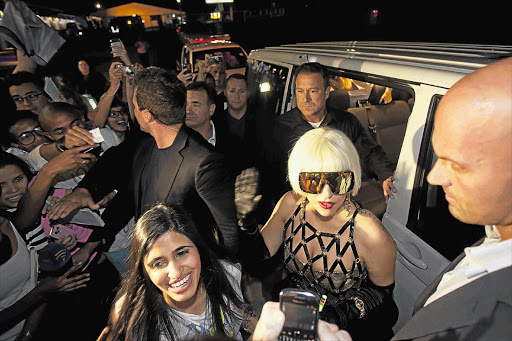 Lady Gaga greets throngs of fans on arrival at Lanseria airport, northwestern Johannesburg. File photo.