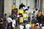 OUT OF FAVOUR: Bafana coach Joel Saantana arrives at OR Tambo International Airport yestrday after friendlies in Europe. Pic. Tshepo Kekana. 15/10/2009. © Sowetan.