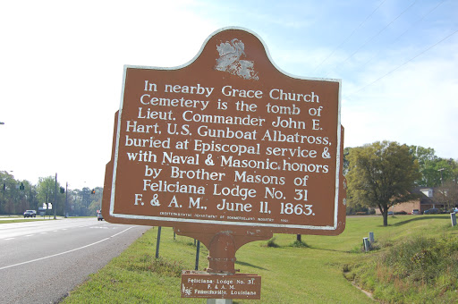 In nearby Grace Church Cemetery is the tomb of Lieut. Commander John E. Hart, U.S. Gunboat Albatross, buried at Episcopal service & with Naval & Masonic honors by Brother Masons of Feliciana Lodge...