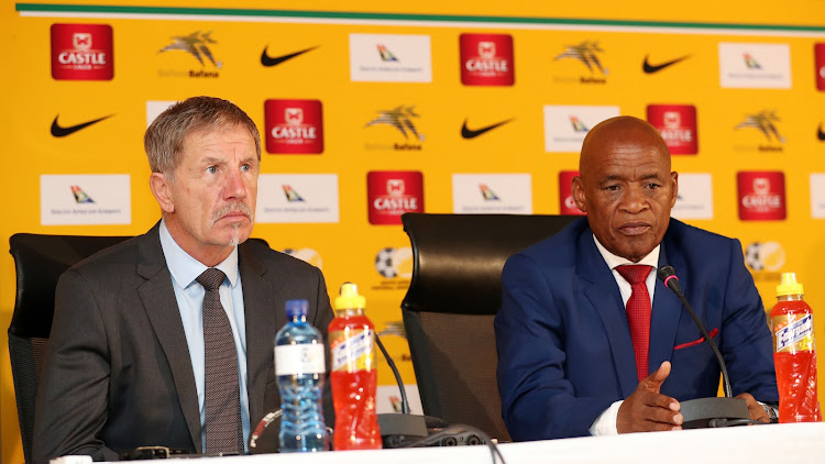 Bafana Bafana head coach Stuart Bexter (L) and the national team manager with Barney Kujane (R) during a media briefing at the SA Football Association headquarters in Nasrec in the south of Johannesburg.
