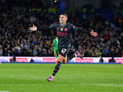 Manchester City's Phil Foden celebrates scoring his side's second goal during the Premier League match against Brighton & Hove Albion at American Express Community Stadium on April 25 2024 in Brighton, England.