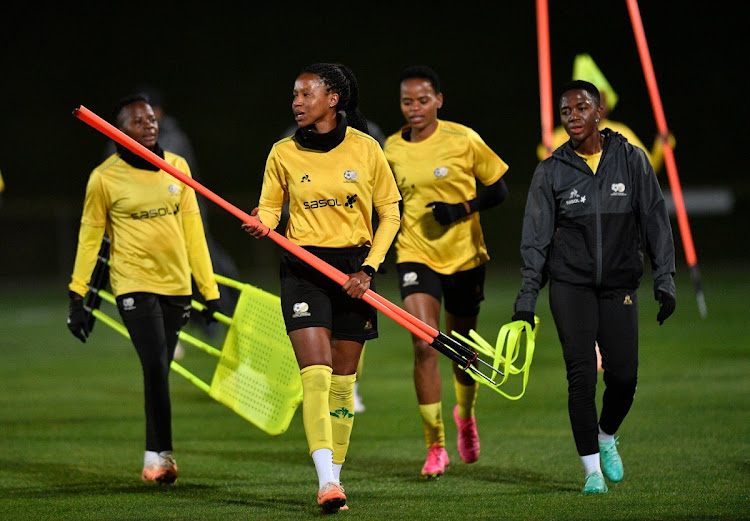 Banyana Banyana players Thembi Kgatlana, Jermaine Seoposenwe and Hilda Magaia (background) after a training session in Wellington, New Zealand, before the start of the 2023 Women's World Cup.
