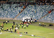 Fans vandalizing the stadium during the 2018 Nedbank Cup match between Kaizer Chiefs and Free State Stars at Moses Mabhida Stadium, Durban on 21 April 2018.