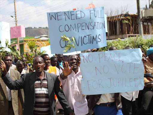 Baringo county residents during a demonstration against escalating insecurity during a visit by Deputy President William Ruto, February 23, 2017. /JOSEPH KANGOGO