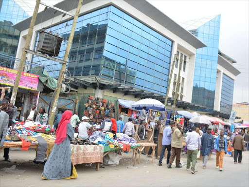 Eastleigh hawkers go about their businesses yesterday as mall owners close shop to protest invasion by hawkers / PATRICK VIDIJA