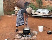Zipho preparing pap at her paternal home in Ga-Marishane 
