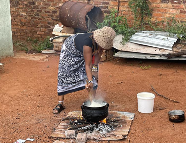 Zipho preparing pap at her paternal home in Ga-Marishane