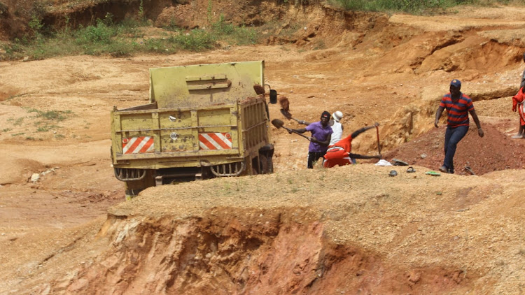 Murram miners load a lorry