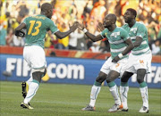 OFF TO ABU DHABI:
      
      
      
       Ivory Coast players  celebrate the goal scored by Romaric  during the 2010 Fifa World Cup match against  Korea DPR 
      
       in Nelspruit.  
      Photo: Gallo Images