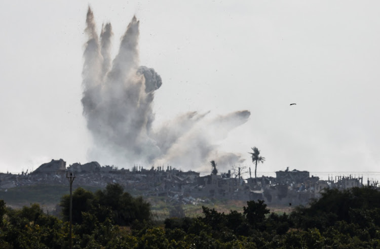 Smoke rises after an explosion in the Gaza Strip following an Israeli airstrike. Picture: AMIR COHEN