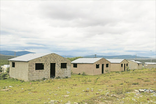 A BLOT ON THE LANDSCAPE: Unfinished and vandalised RDP houses in Middledrift town Picture: MICHAEL PINYANA