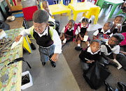 Zinedene Williams, 5, cries for his mom on his first day at school at Morgenson Primary in Hanover Park, Cape Town, yesterday See Page 4 Picture: ESA ALEXANDER