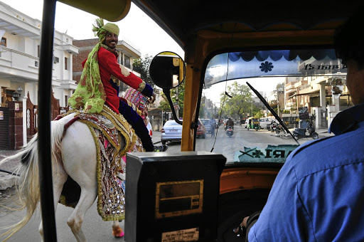 Traffic in Jaipur, India, is a mad agglomeration of cars, bicycles, tuk-tuks, motorbikes and dogs, as well as the odd horseman.