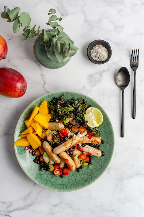 Mango and chicken chipolata salad with black beans.