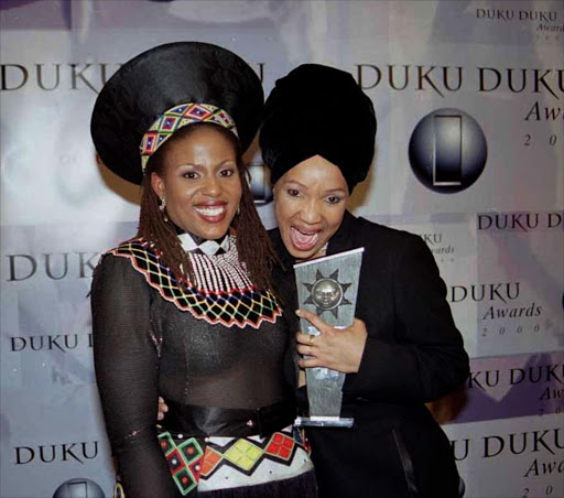 TV personalities Pamela Nomvete and Vinolia Mashego at the Duku Duku Awards in 2000. Picture credit: Lucky Nxumalo