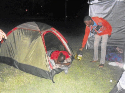 DETERMINED: North West University SRC members camp outside the gate. Photo: Boitumelo Tshehle