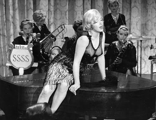 Actress Marilyn Monroe performs a scene from the movie 'Some Like It Hot' directed by Billy Wilder and released March 29, 1959. 'Some Like It Hot' won an Academy Award for Best Costume Design.