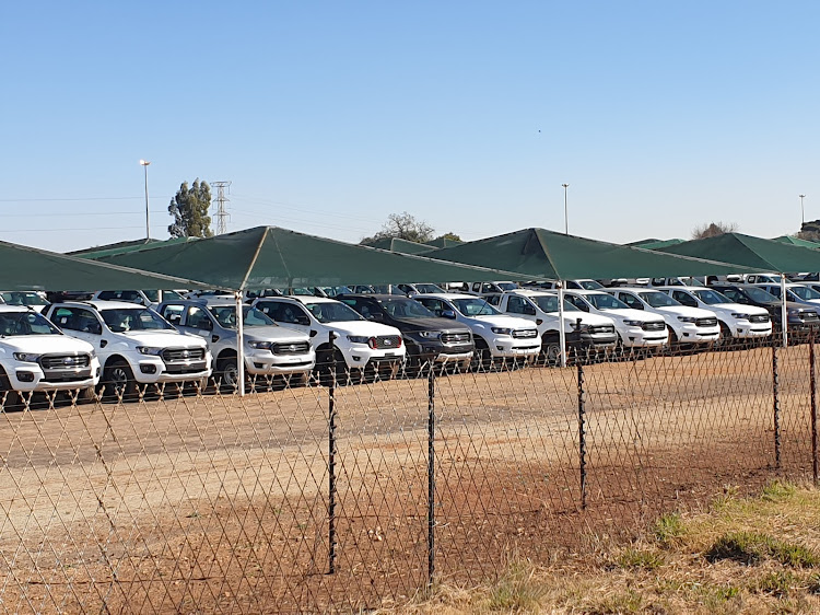 New vehicles at a storage depot await delivery to dealer floors. Picture: DENIS DROPPA