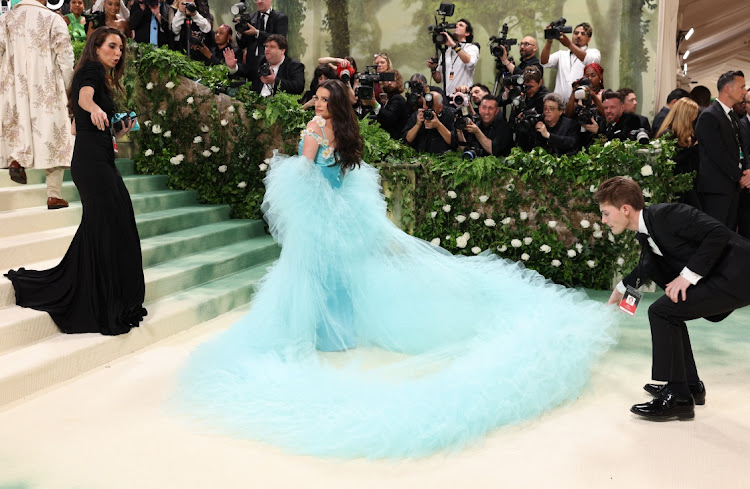 Lea Michele looks for a Rihanna moment at the Met Gala.