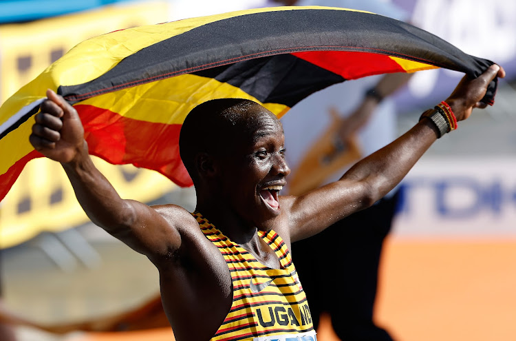 Victor Kiplangat of Uganda celebrates after winning the men's marathon at the World Athletics Championships in Budapest, Hungary on August 27, 2023