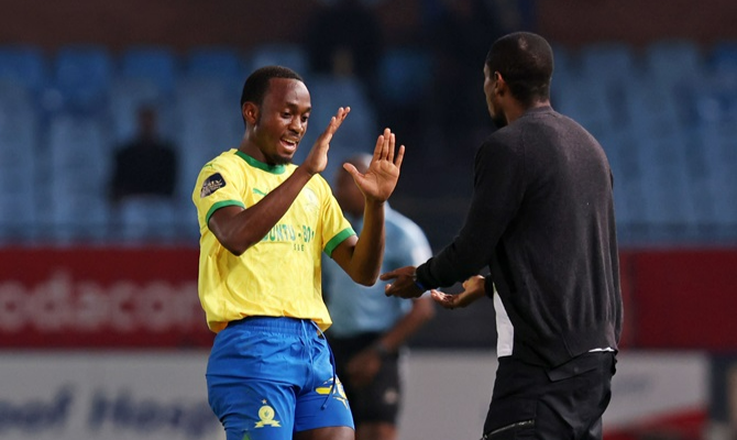 Mamelodi Sundowns striker Peter Shalulile celebrates one of his goals with coach Rulani Mokwena during their DStv Premiership win over TS Galaxy at the Loftus Stadium.