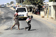 SURFACE CALM: Diepsloot was quiet yesterday after angry residents took to the streets and blocked roads in the township on Tuesday following the discovery of the bodies of two murdered toddlers