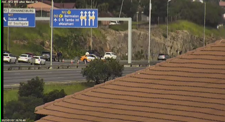 JMPD members on scene. A section of the N12 highway in southern Johannesburg has been closed down by the JMPD after a petrol tanker overturned on the Klipriver Drive overpass and petrol was spilt on the highway.