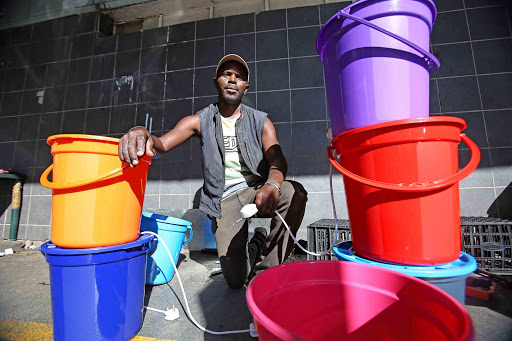 SURVIVING: Zimbabwean hot-water urn maker Webster Hore managed to raise enough money to bring his refugee brother and his family from Durban to East London after they were caught up in the xenophobic attacks Picture: MARK ANDREWS