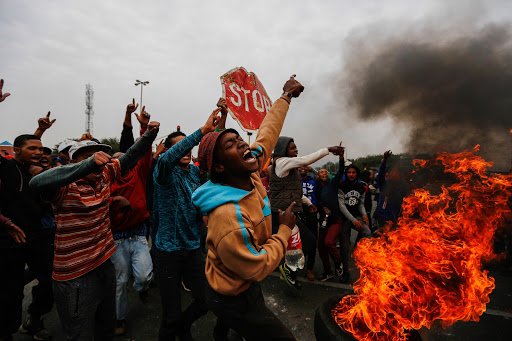 Police clashed with residents of Eldorado Park, south of Johannesburg on 8 May2017. Police fired rubber bullets at demonstrators who targeted several shops. Residents are angry about being evicted from Freedom Park last month and are demanding land to build houses.