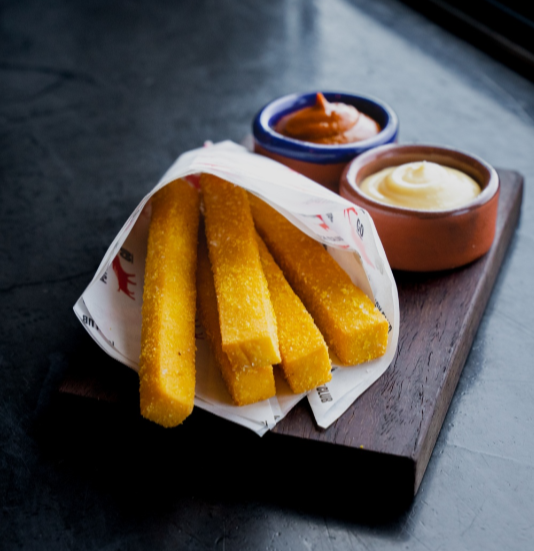 Chickpea, goats cheese and parmesan fries with truffle aioli and smoked ketchup.