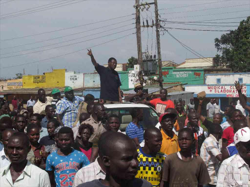Bungoma residents march in the town centre following an address by Senator and Ford Kenya party boss Moses Wetang'ula, October 27, 2017. /BRIAN OJAMAA