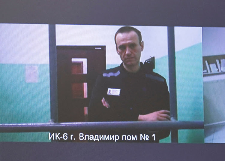 Russian opposition politician Alexei Navalny appears on a screen via video link from the IK-6 penal colony, in Moscow, Russia, September 26 2023. Picture: YULIA MOROZOVA/REUTERS