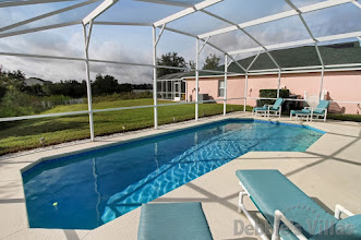 South-facing private pool with lake view at this villa in Davenport