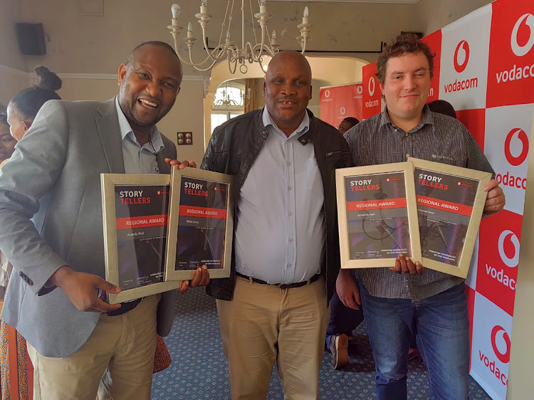 From left Daily Dispatch deputy editor Bongani Fuzile, together with Lulamile Feni from Mthatha, and Matthew Field, receiving the Vodacom awards on behalf of the Daily Dispatch team in Gqeberha.