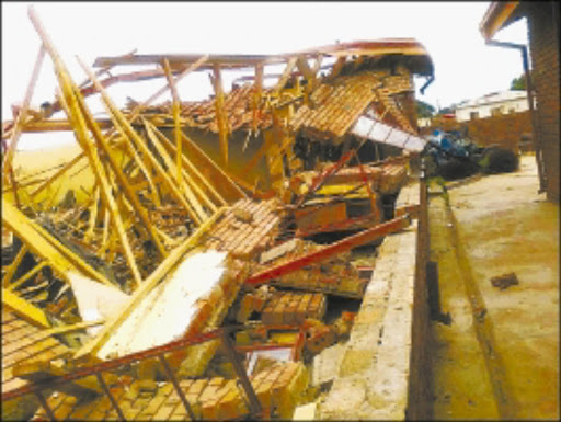 D E ST R OY E D : A section of the tribal authority building which collapsed after heavy storms hit Zebediela on New Year's Day. Pic. ALEX MATLALA. 01/01/2010. © Sowetan.
