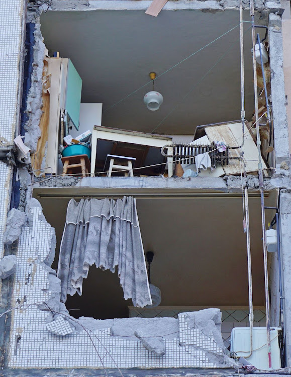 A residential building damaged by recent shelling in Kharkiv, Ukraine, February 27 2022. Picture: VITALIY GNIDYI/REUTERS