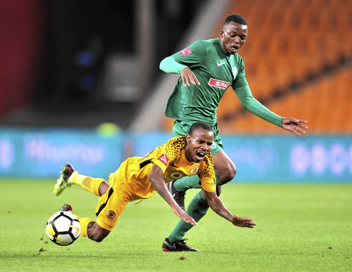 Joseph Molangoane of Kaizer Chiefs tumbles after a challenge by Butholezwe Ncube of AmaZulu during their Absa Premiership match at FNB Stadium on Saturday night. The teams played to a goalless draw.
