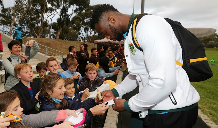 Springbok captain Siya Kolisi signs autographs during the national team's training session at SK Walmer Green Point, Cape Town on June 21 2018.