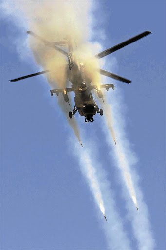 A Rooivalk helicopter during a demonstration in Makhado, Limpopo. The Rooivalk is among the aircraft that might be taken out of service because of insufficient funds