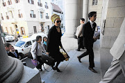 Thandi Maqubela arrives at the Cape Town High Court, where she and former pastor Vela Mabena are on trial for the murder of her husband, Acting Judge Patrick Maqubela, in 2009. File photo.