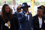 Finance minister Enoch Godongwana arrives at the Cape Town City Hall before his 2024 budget speech on February 21 2024.