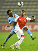 Azola Jakalashe of Spurs and Tlou Nkwe of Polokwane City
locked in an aerial battle on Tuesday.