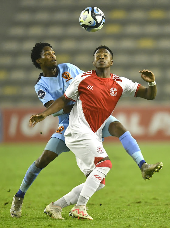 Azola Jakalashe of Spurs and Tlou Nkwe of Polokwane City locked in an aerial battle on Tuesday.