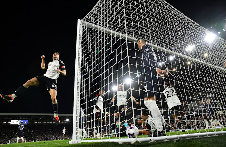 Fulham's Joao Palhinha and teammates celebrate their third goal, scored by Rodrigo Muniz in their Premier League match against Tottenham Hotspur at Craven Cottage in London, Britain, on March 16 2024. Picture: DYLAN MARTINEZ/REUTERS