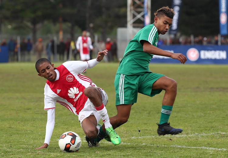 Tashreeq Matthews of Ajax Cape Town battles for the ball with Jayden Wakefield of Old Mutual Academy in the final of the 2017 Engen Knockout Challenge Cape Town at Parow Park, Parow, Cape Town on July 2 2017.