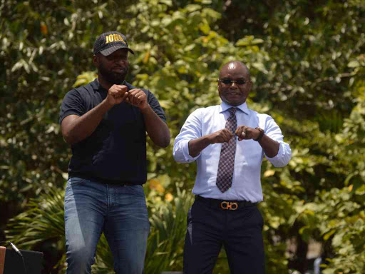 Mombasa Governor Hassan Joho and Kilifi's Amason Kingi address their supporters at Treasury Square after Joho recorded a statement at the DCI over forgery claims, March 29, 2017. /JOHN CHESOLI