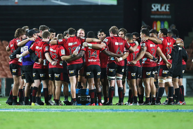 The Crusaders in a team discussion ahead of their Super Rugby semifinal win over the Hurricanes on July 28 2018 in Christchurch to set up a final meeting with the Emirates Lions on Saturday August 2 2018.