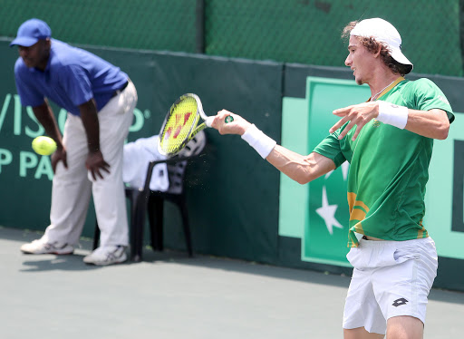 Lloyd Harris of South Africa in action against Vladimir Ivanov during the opening singles of the Davis Cup tie between South Africa and Estonia at the Irene Country Club on February 03, 2017 in Pretoria, South Africa. File photo